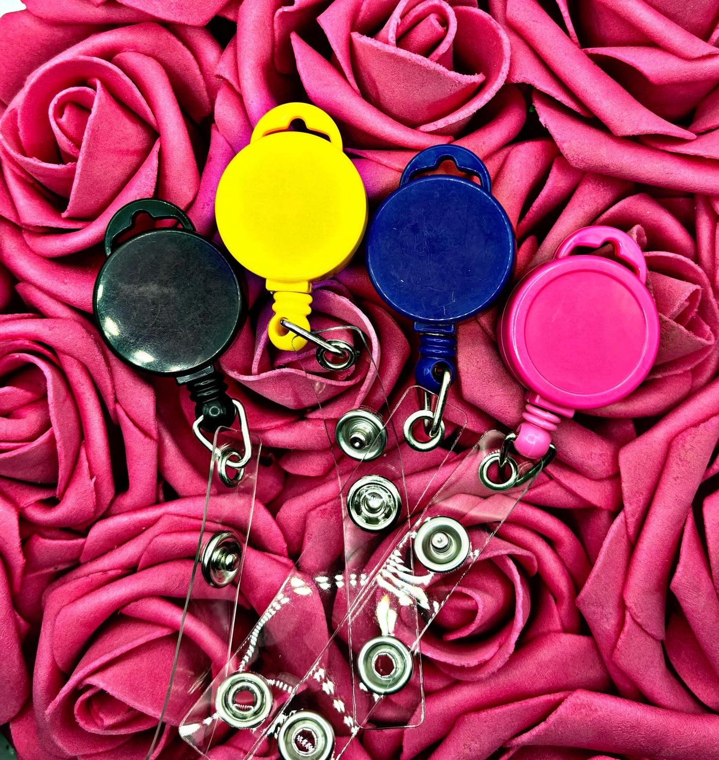 Interchangeable badge reel for lanyards