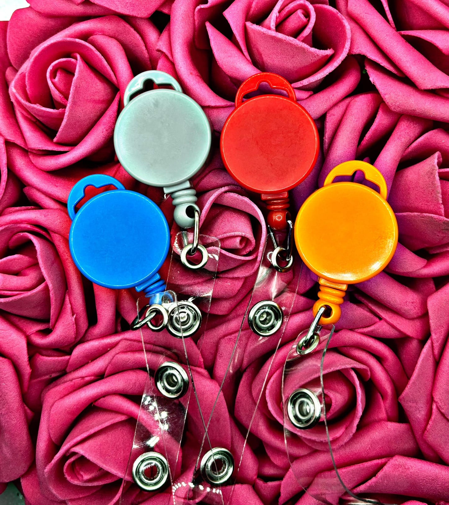 Interchangeable badge reel for lanyards